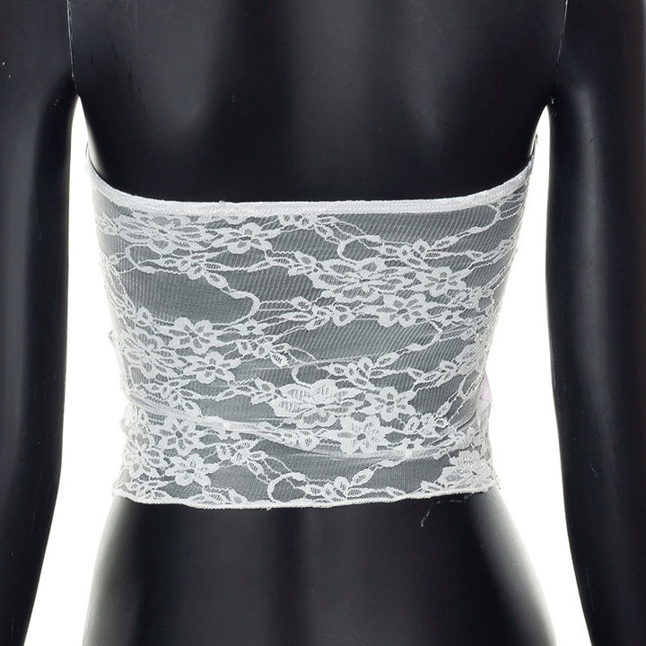 Dame Bandeau-top med blomsterdetaljer og spiss avslutning Skjora