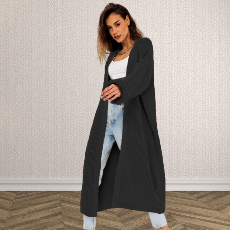 Kvinnens chunky strikk cardigan med åpen frontdesign og dype lommer Skjora