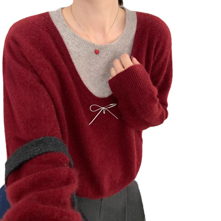 Kvinnesweater med elegant V-hals og premium sløyfeapplikasjon Skjora