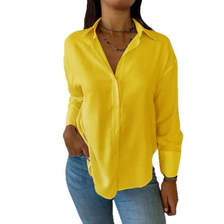 Dame elegant langermet bluse med fint stoff og feminine detaljer Skjora