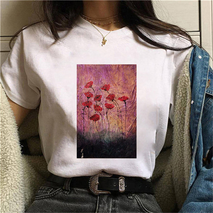Dame T-skjorte med blomstertrykk og kreativt kunstmotiv Skjora