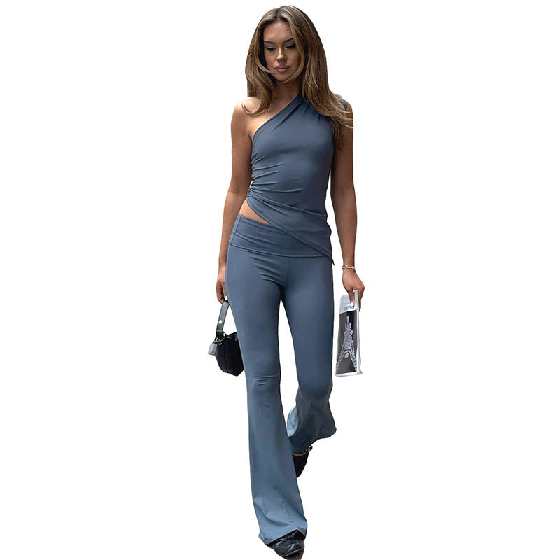 Dame asymmetrisk jumpsuit med dekorativt innviklet design og mykt, elastisk materiale Skjora