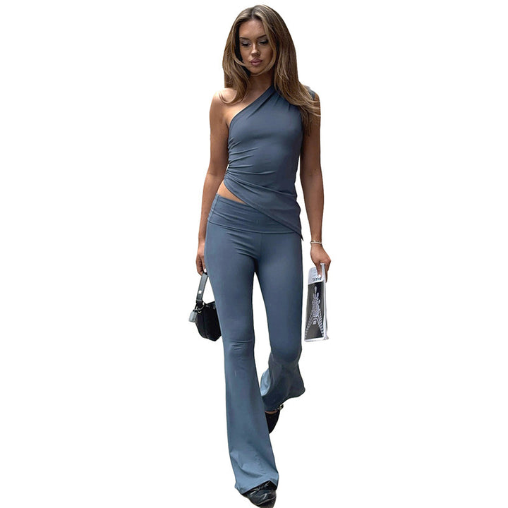Dame asymmetrisk jumpsuit med dekorativt innviklet design og mykt, elastisk materiale Skjora