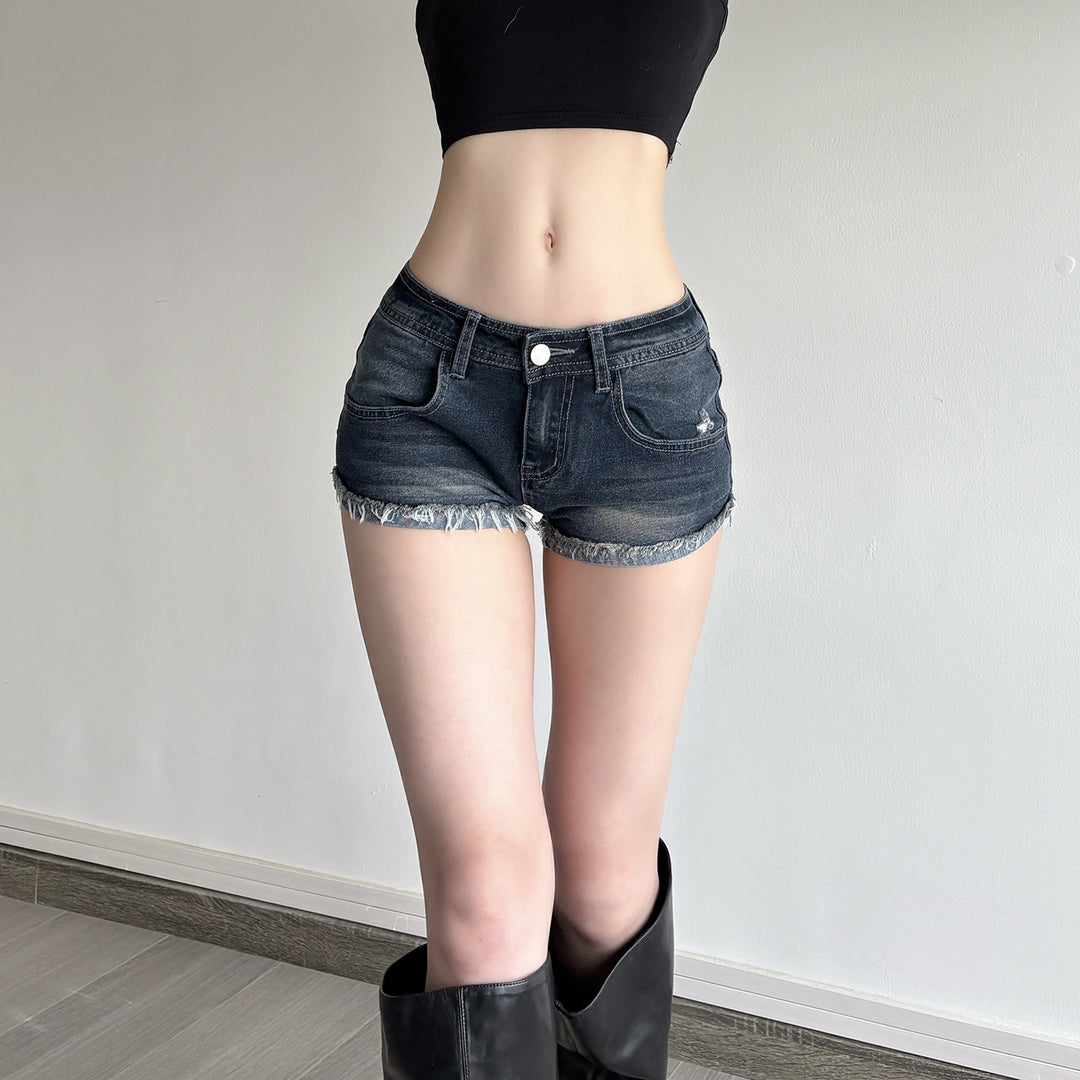 Dame denim-shorts med frynset kant skjorte