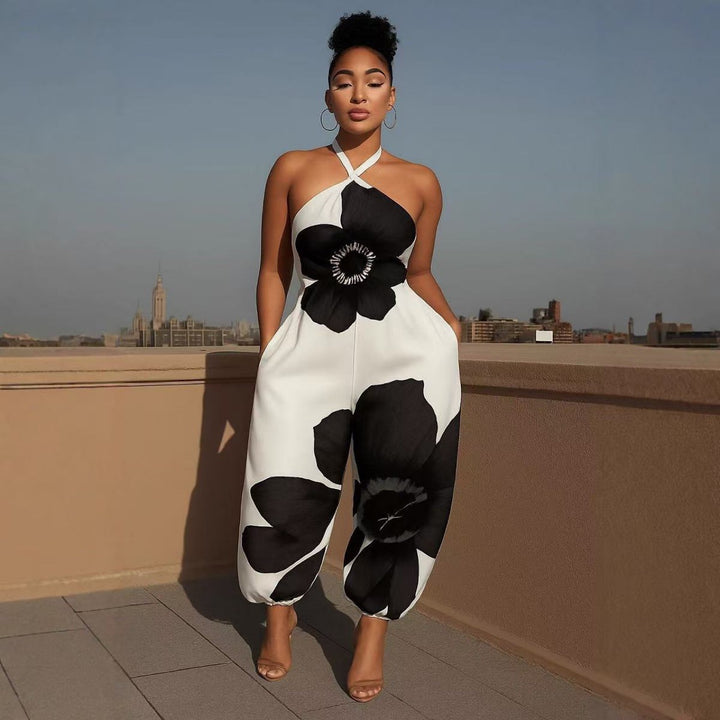 Kvinner Elegant Jumpsuit med Blomsterdesign og Raffinerte Stropper Skjora