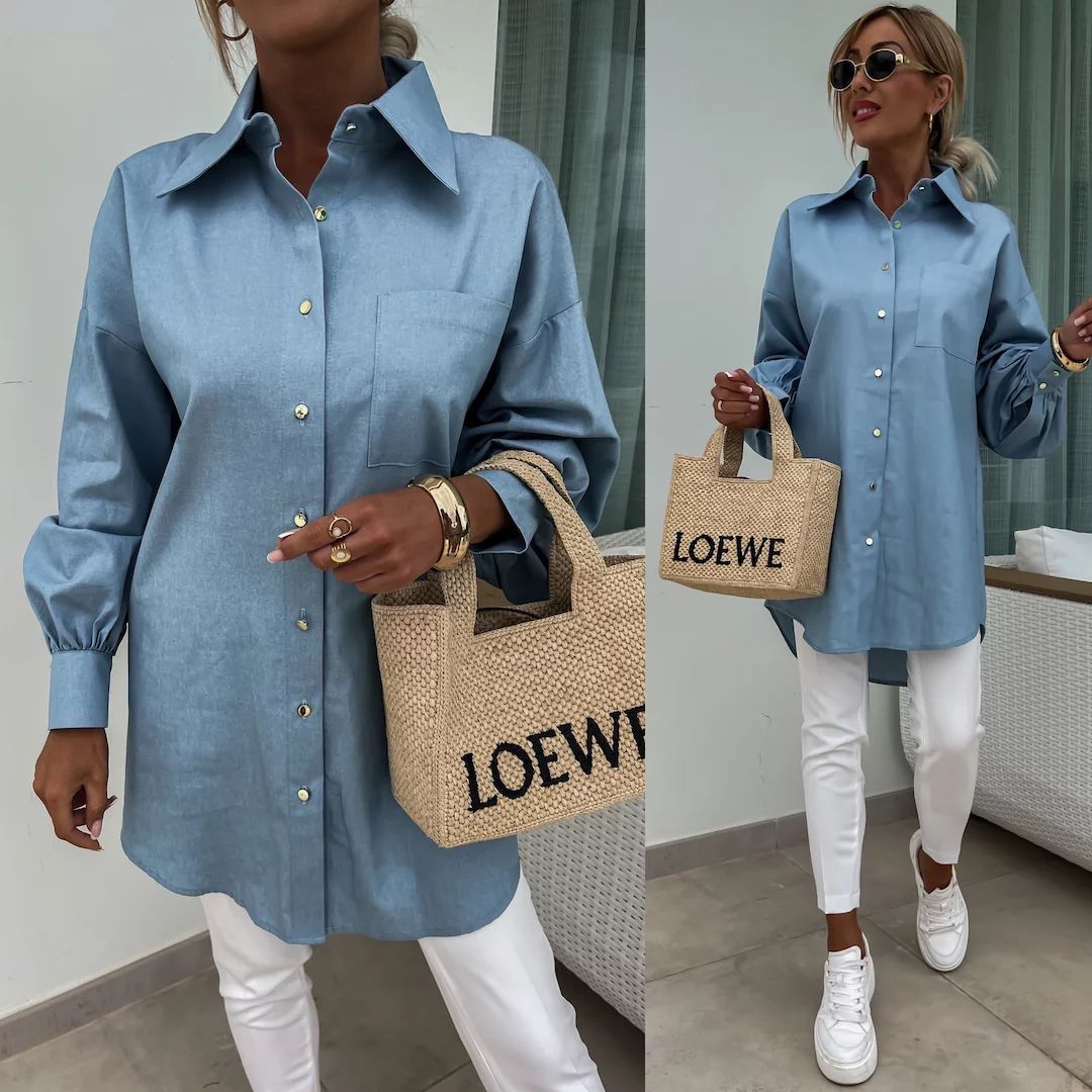 Kvinnes klassiske oversized blouse med knappedetaljer og brystlomme Skjora