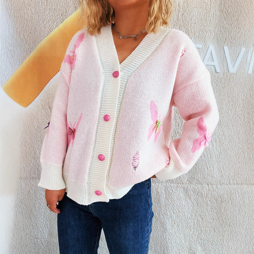 Dame koselig cardigan med fargerik sommerfugldesign og knappestolpe Skjora
