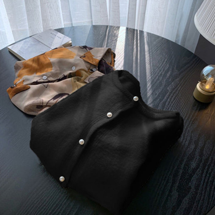 Dame cardigan med elegante perleknapper og moderne design Skjora