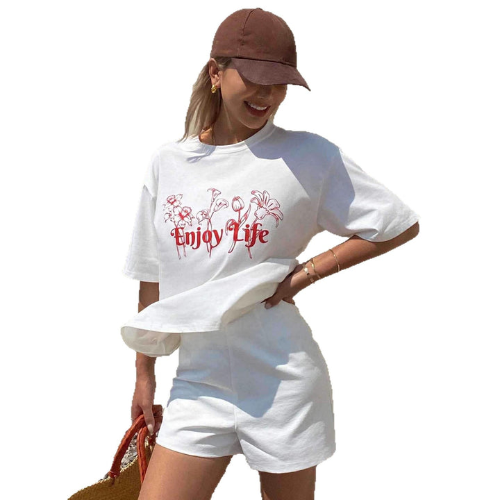 Dame Løs Oversize T-skjorte med floraltrykk og inspirerende tekst Skjora