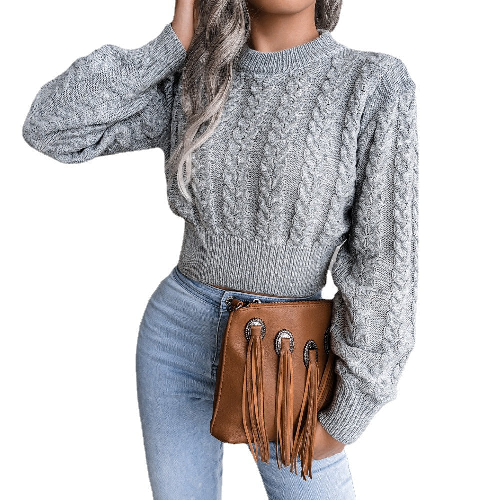 Kvinnens chunky strikkegenser med kabeldesign og ledig passform Skjora