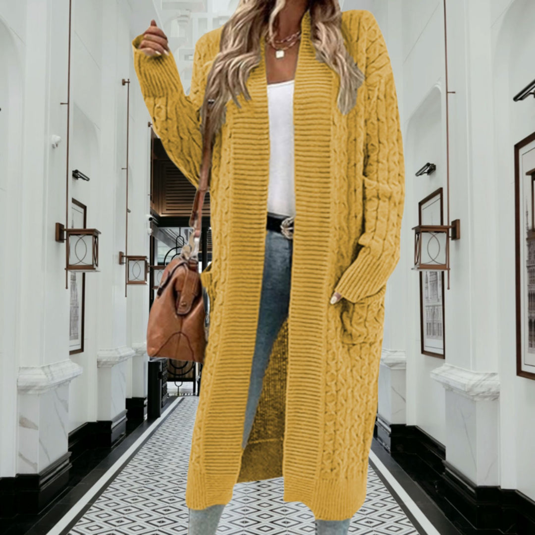 Kvinnes chunky strikket cardigan med åpen design og praktiske lommer Skjora
