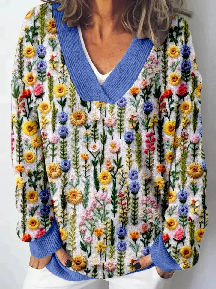 Dame V-hals genser med blomstermønster og avslappet passform Skjora