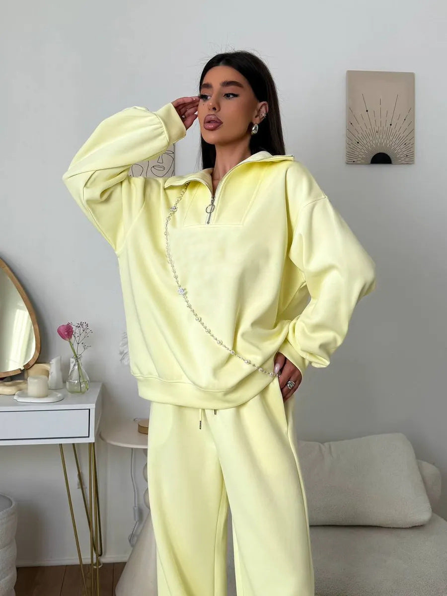 Kvinnens elegante fleece treningsoverall med høy krage og praktisk glidelås