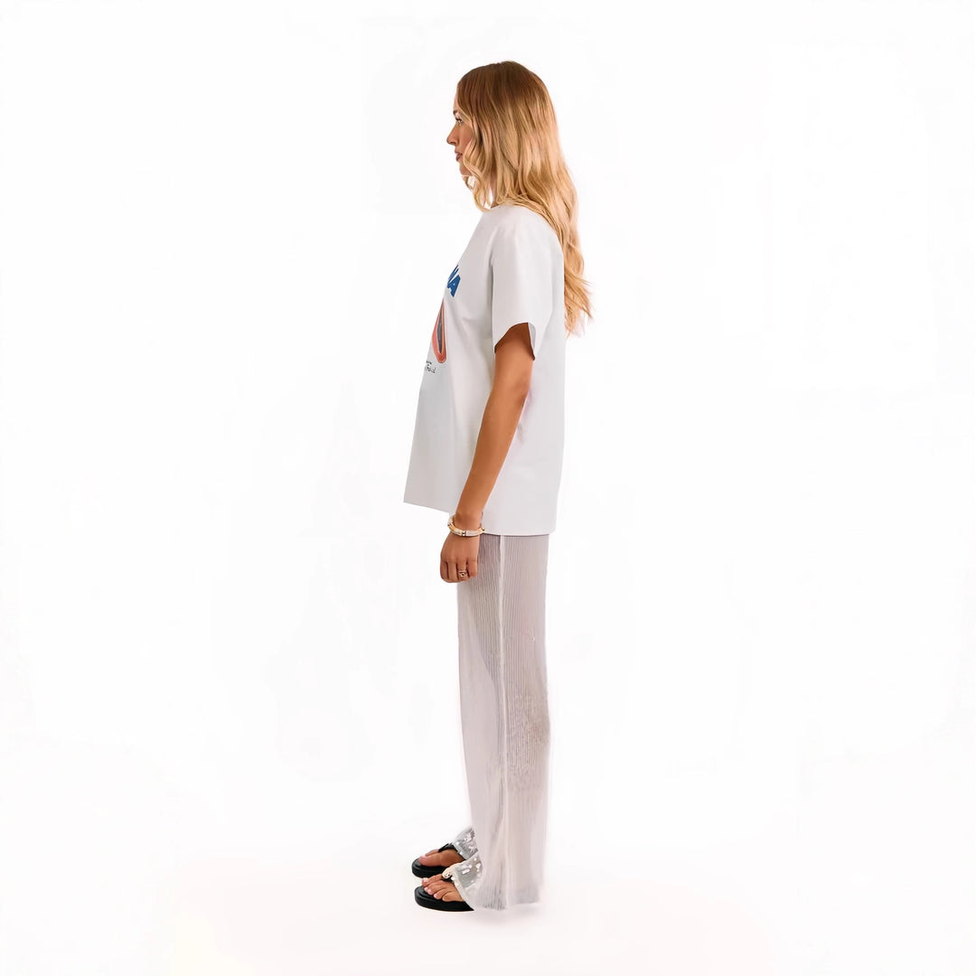 Kvinnelige elegante paljettbukser med gjennomsiktig chiffon og vid cut Skjora