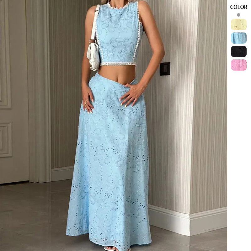 Kvinnenes maxikjole med delikat hullbroderimønster og trendy crop top Skjora