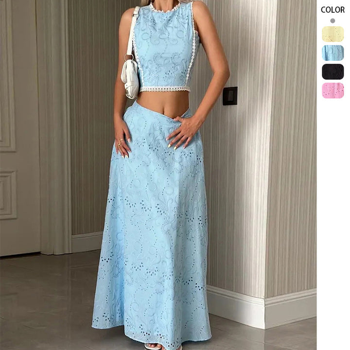 Kvinnenes maxikjole med delikat hullbroderimønster og trendy crop top Skjora