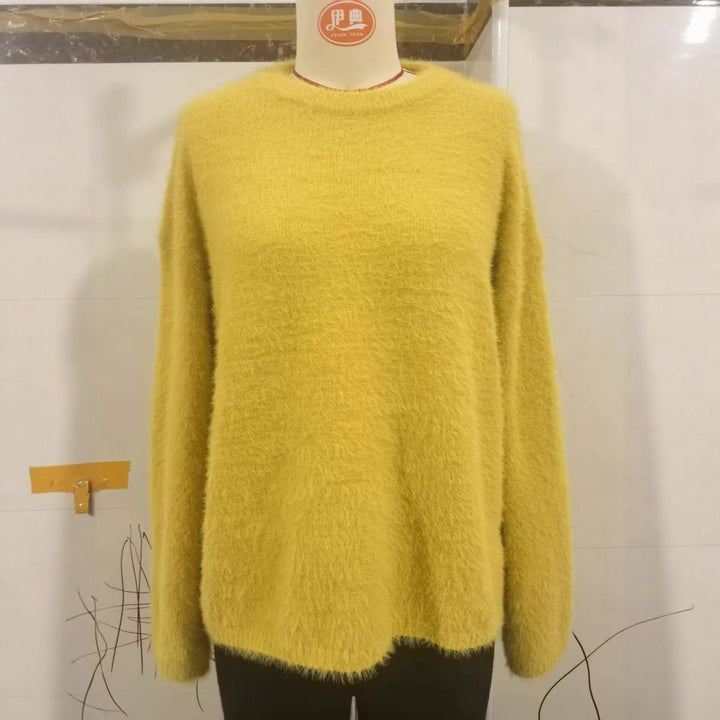 Kvinners fluffy genser med oversized snitt laget av mohairull Skjora