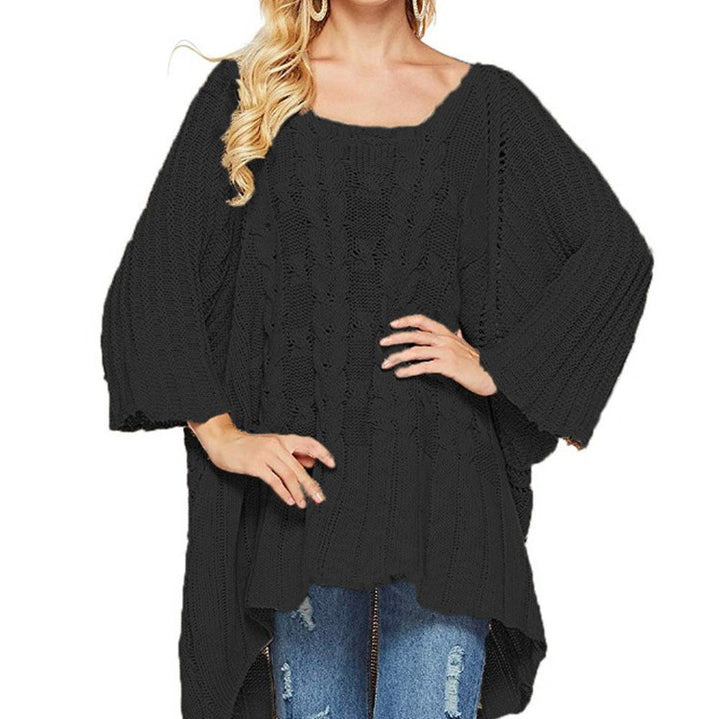 Kvinnes chunky strikket poncho med trendy kabelforløpning og brede ermer Skjora
