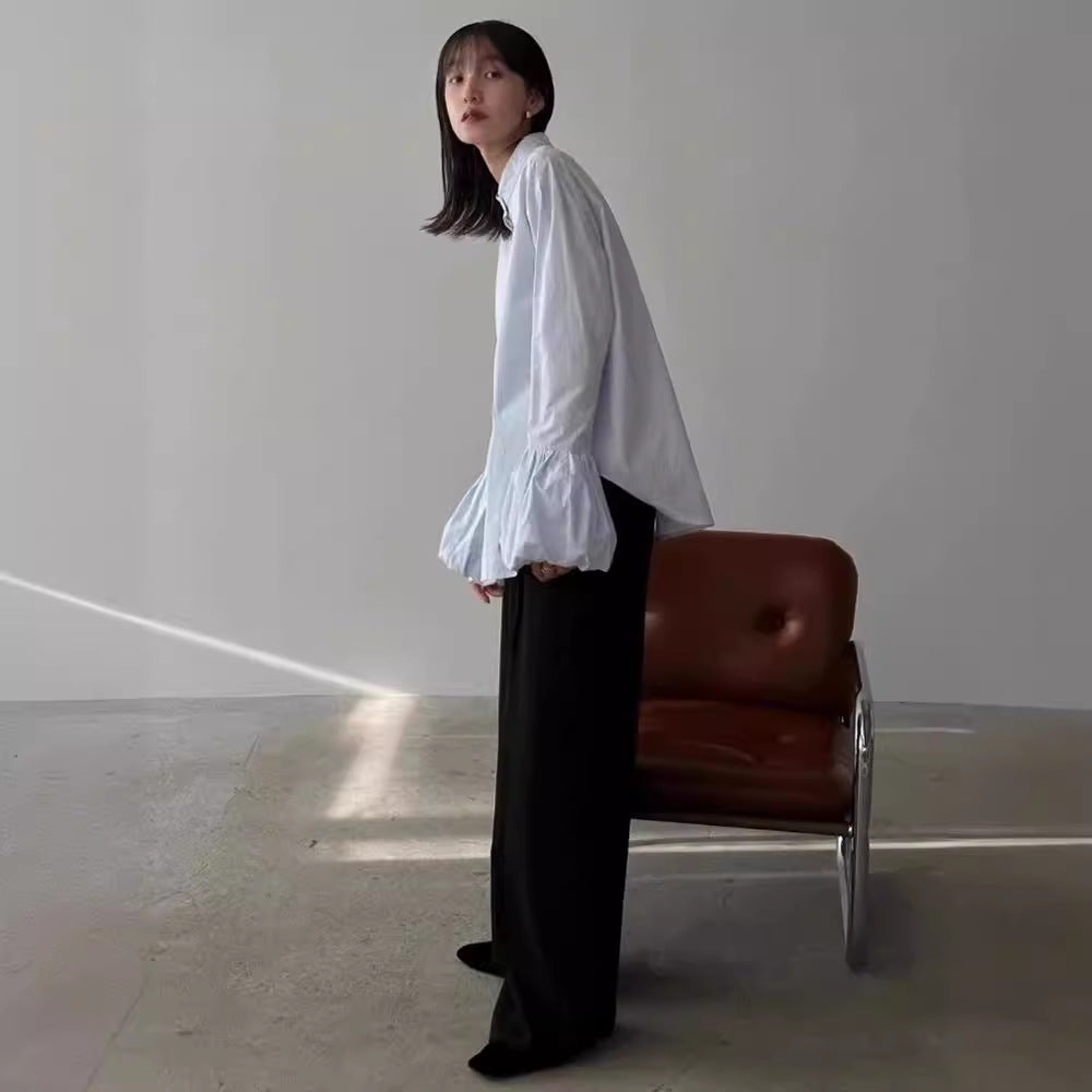 Dame Elegant bluse med voluminøse ermer og ståkrage Skjora