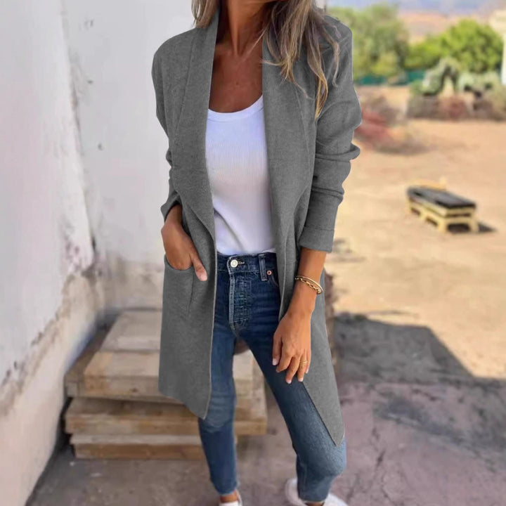 Women's casual oversized jacket with side pockets and an open collar Skjora