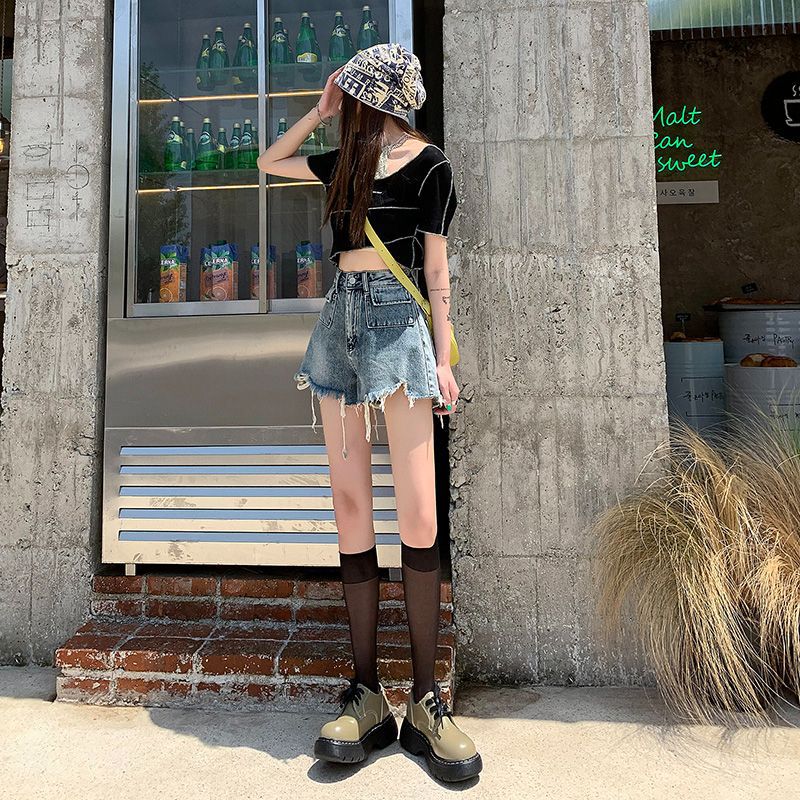 Dame denim shorts med frynsetermer og unikt broderidetalj Skjora