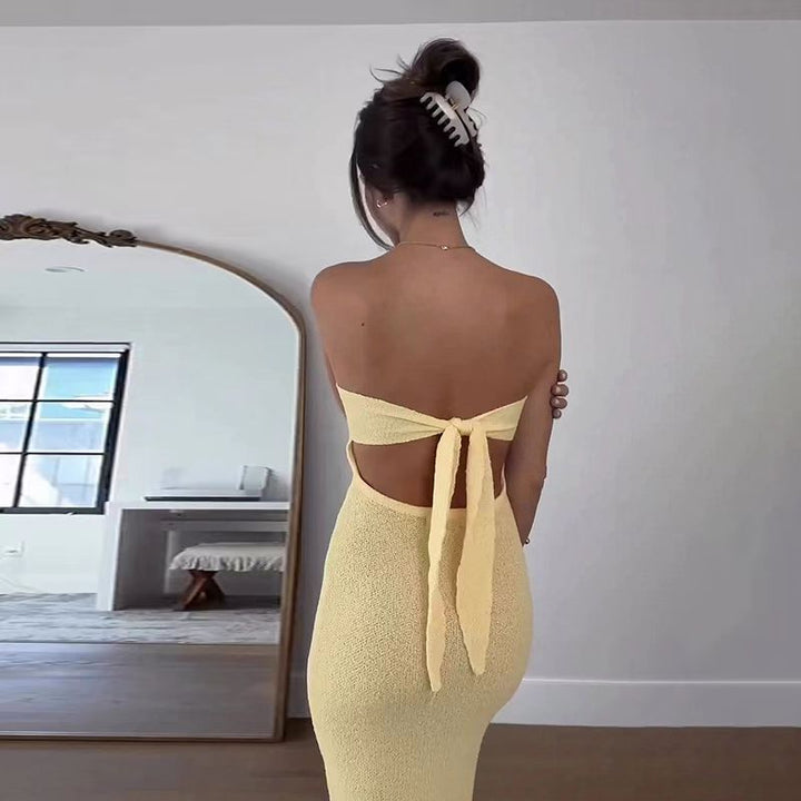 Dame maxikjole med elegant bandeau-utskjæring og minimalistisk silhuett Skjora