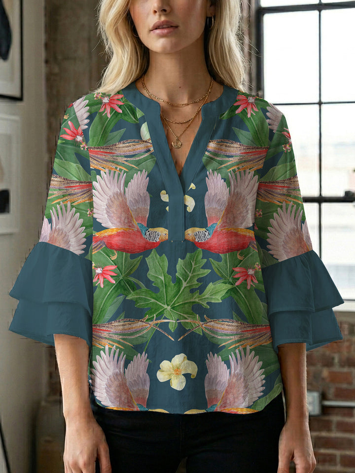 Damebluse med voluminøse ermer og blomsterdesign Skjora