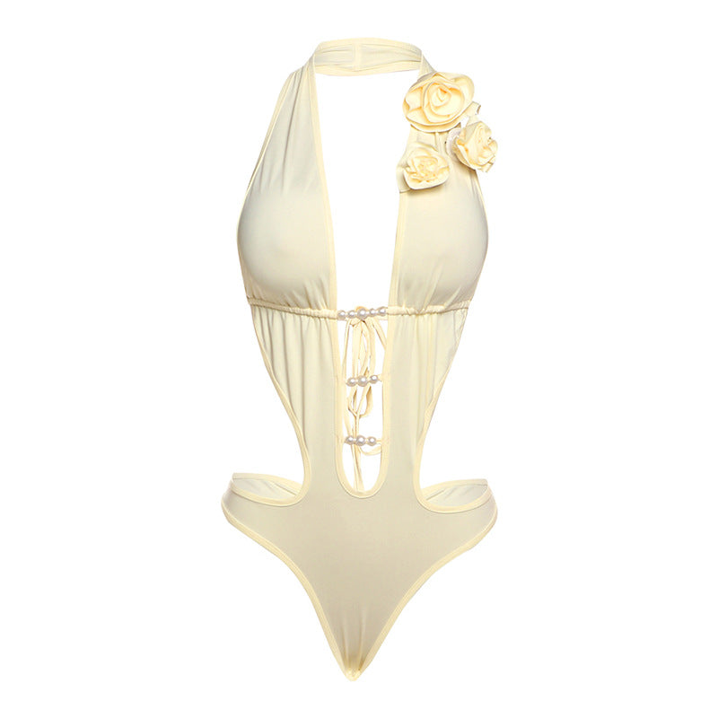 Damer Elegant badebukser med fremragende cut-out-design og blomsterakent Skjora