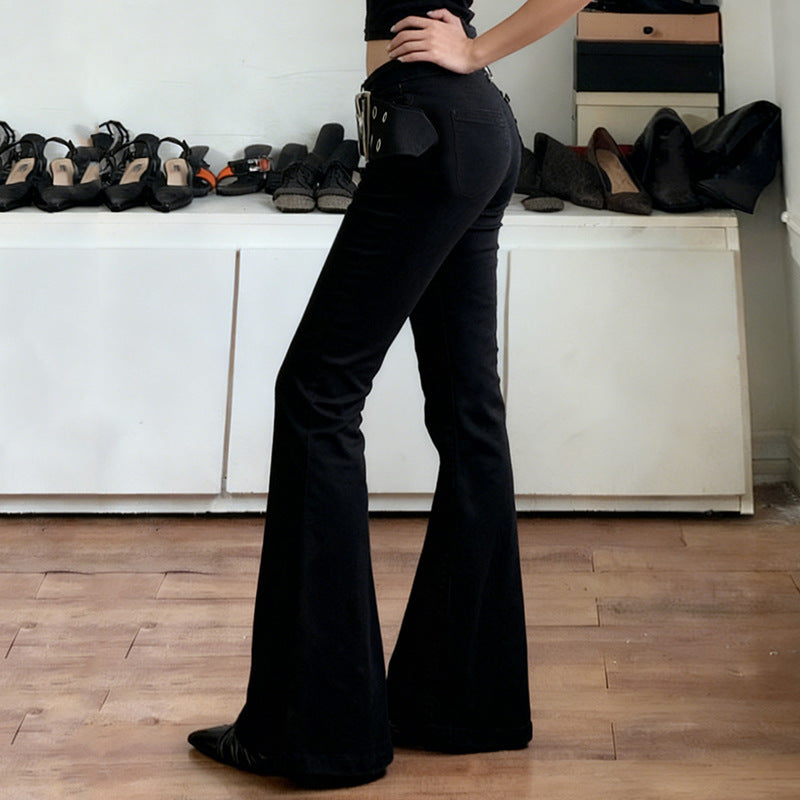 Dame Flared Jeans med justerbart belte og moderne hull-design Skjora