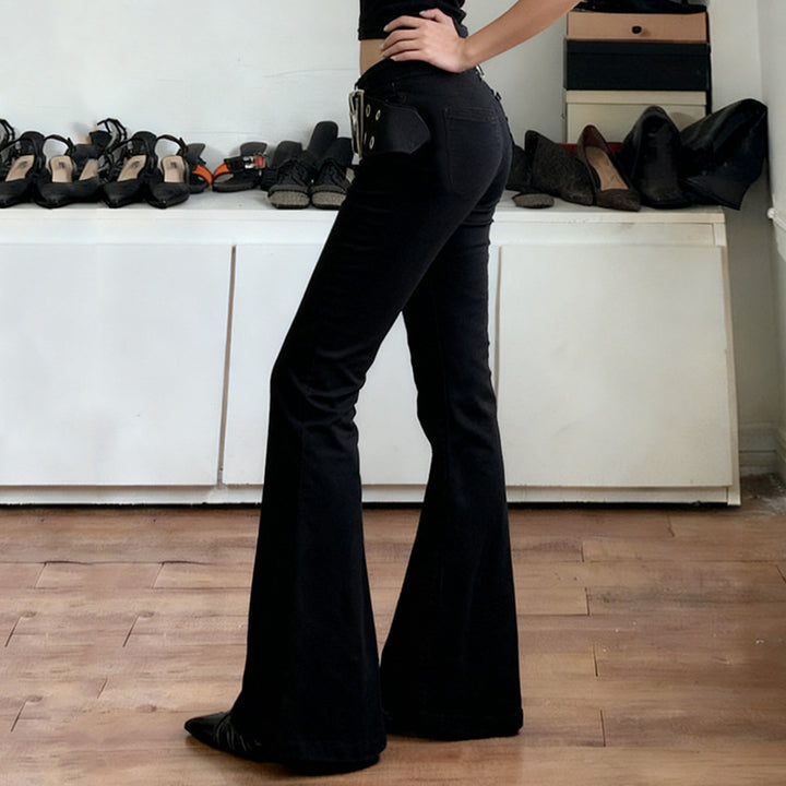 Dame Flared Jeans med justerbart belte og moderne hull-design Skjora