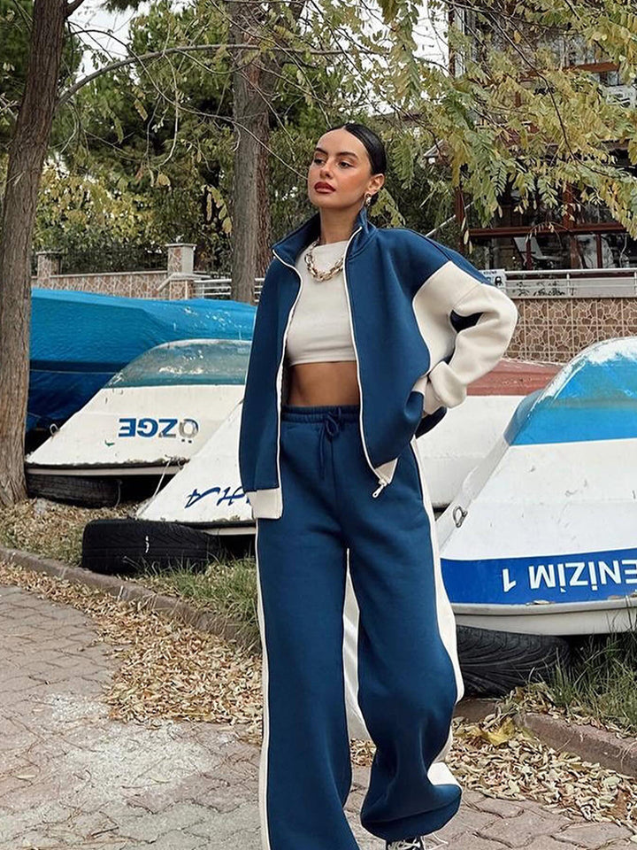 Kvinnelig sporty loungewear-sett med jakke og vide bukser Skjora