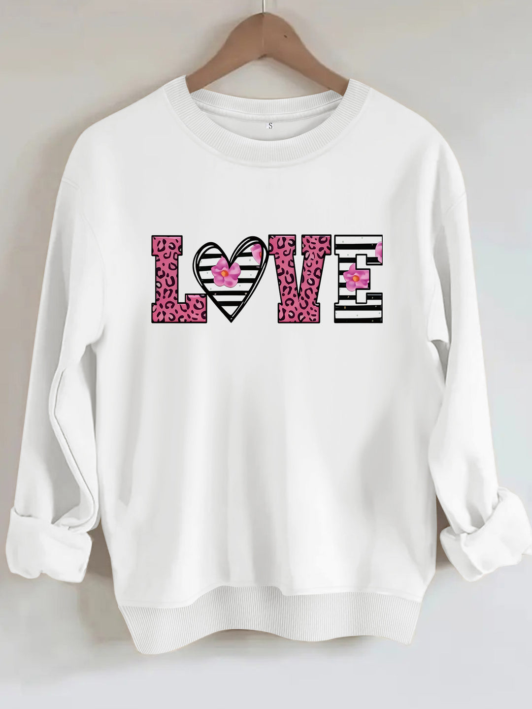 Dame sweatshirt med moderne leopard hjerte-design og behagelig passform Skjora