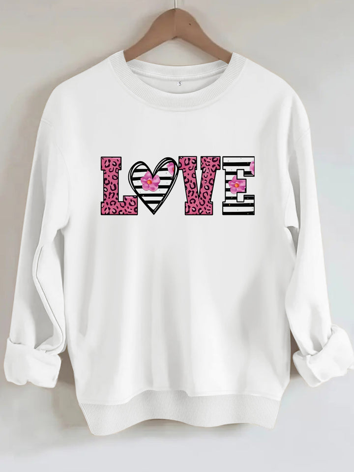 Dame sweatshirt med moderne leopard hjerte-design og behagelig passform Skjora