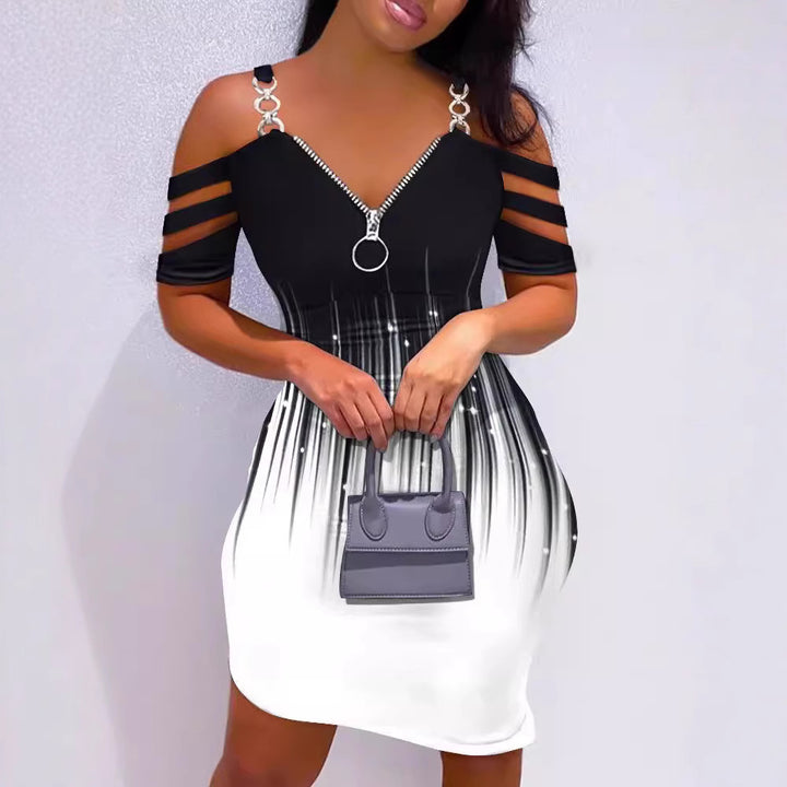 Damekjole med off-shoulder-design og glidelåsdetalj Skjora