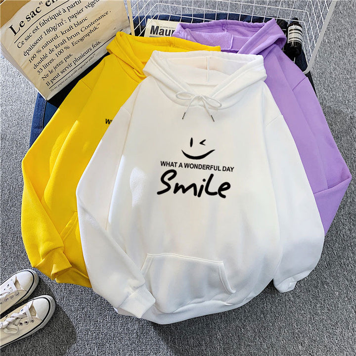 Dame hettegenser med gledelig smile-print Skjora
