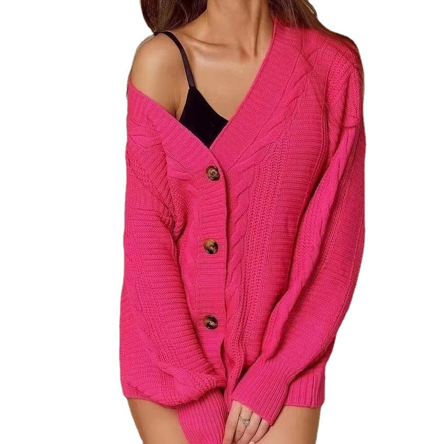 Kvinnes chunky strikket cardigan med voluminøse ermer og knappedetalj Skjora