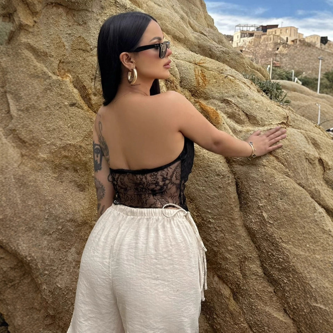 Damer Elegant Bandeau-topp med raffinert spissdeksel og lekent knute Skjora