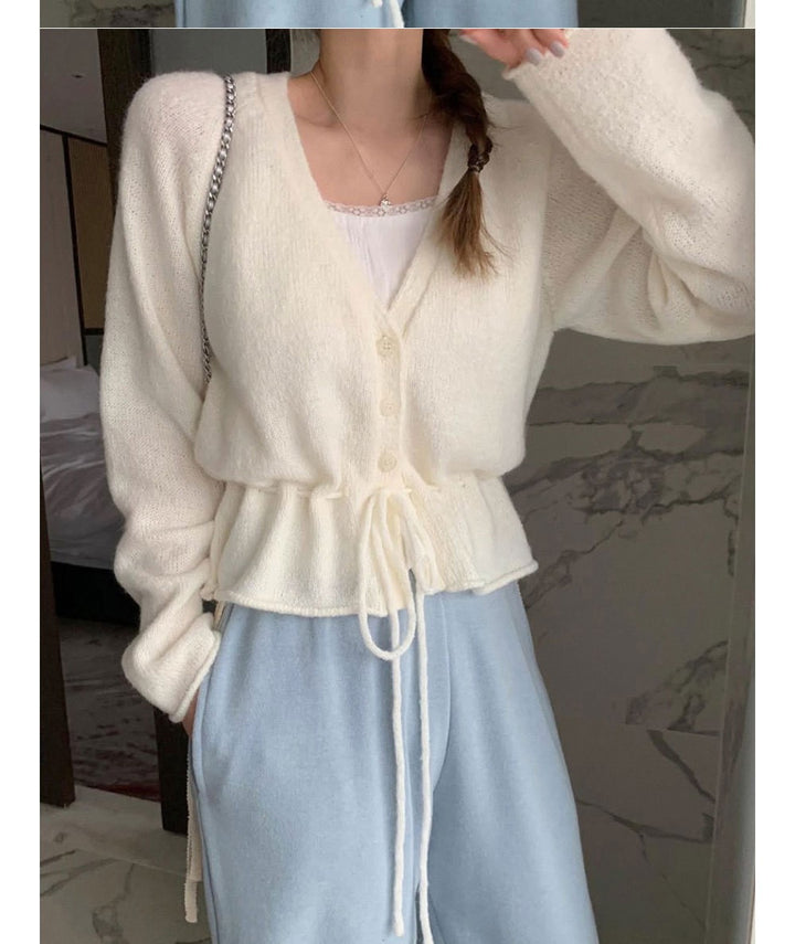 Dame cardigan med justerbart belte og luftige ermer Skjora