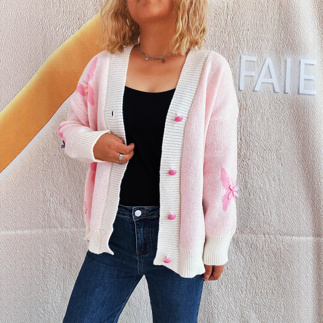 Dame koselig cardigan med fargerik sommerfugldesign og knappestolpe Skjora