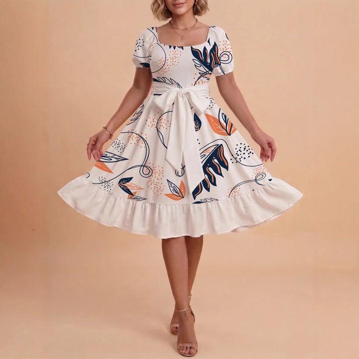 Damen Sommerliches Blumenkleid mit taillierbarem Gürtel und voluminösen Ärmeln Skjora
