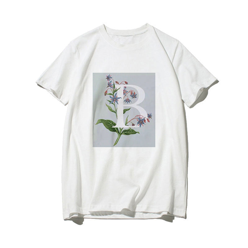 Dame T-skjorte med blomsterdesign og kreativt trykk Skjora