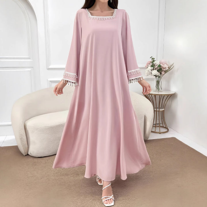 Kvinne Elegant Maxi Kjole med Dekorative Frynser og Brede Ermer Skjora