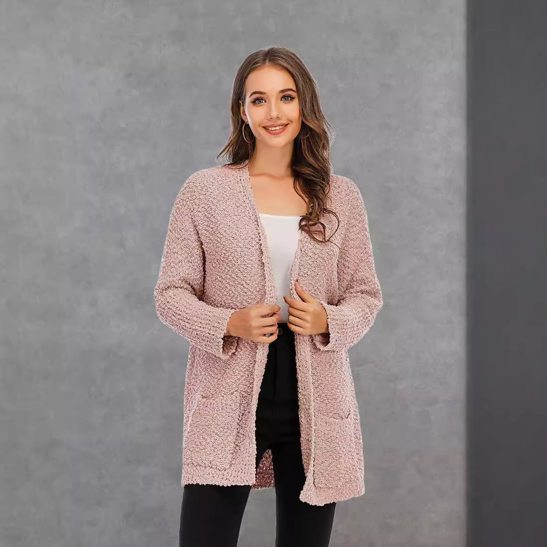 Kvinnekomfortabel cardigan med åpen skjæring og store lommer Skjora