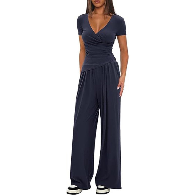 Dame avslappet jumpsuit med omslagsdesign og vid ben Skjora