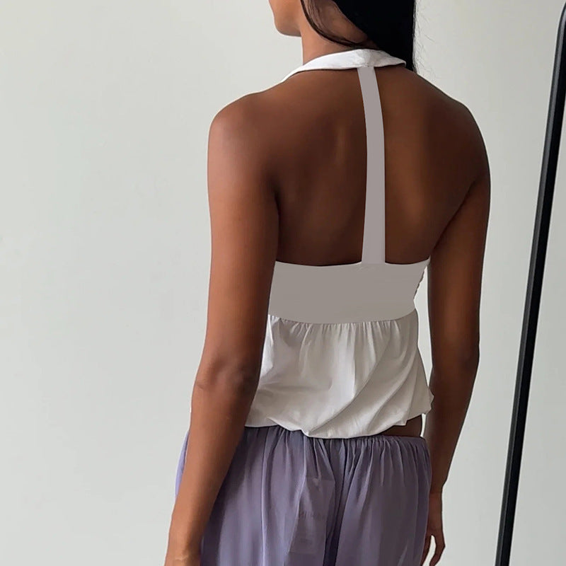 Dame Cut-Out Top med flytende snitt og V-hals Skjora