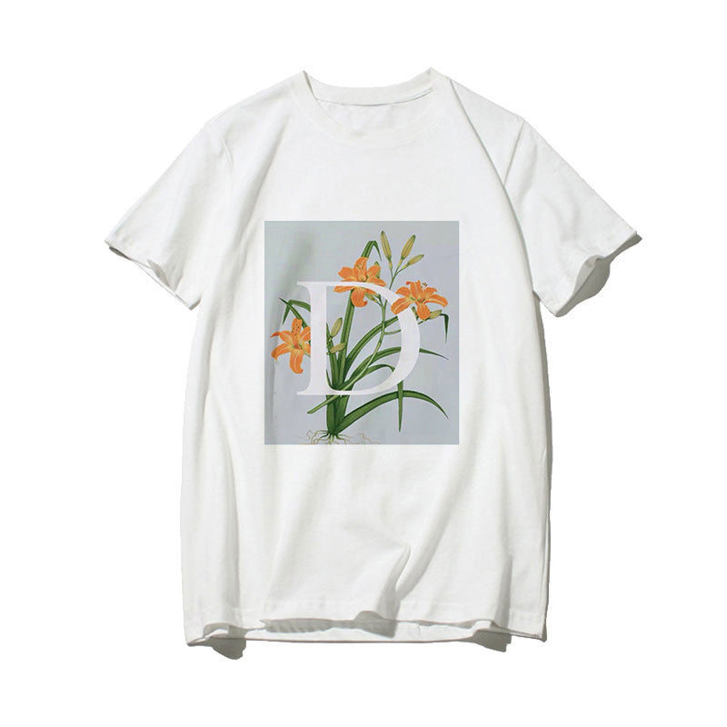 Dame T-skjorte med blomsterdesign og kreativt trykk Skjora