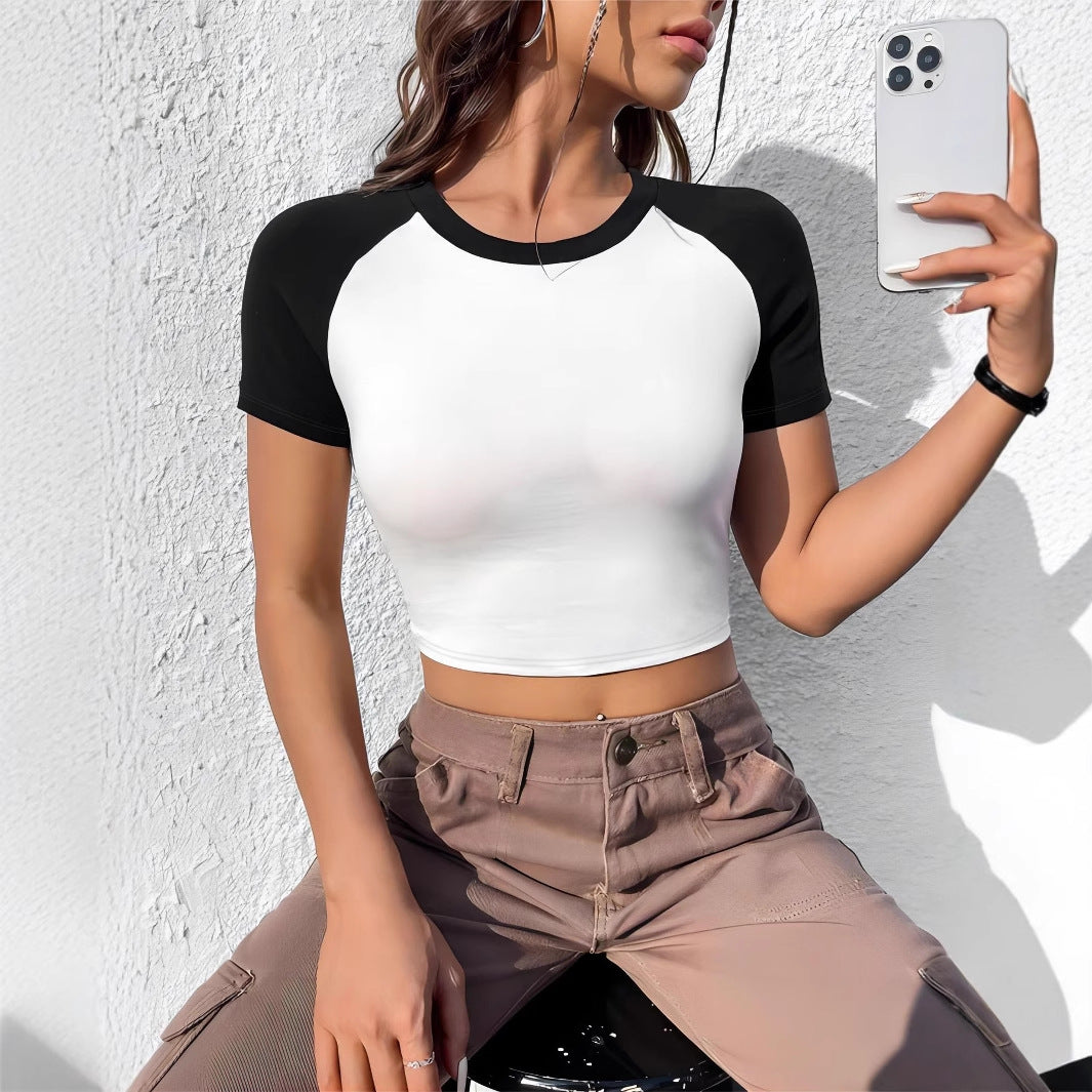 Dame Crop-T-skjorte med moderne raglan-snitt og figurtilpasset design Skjora