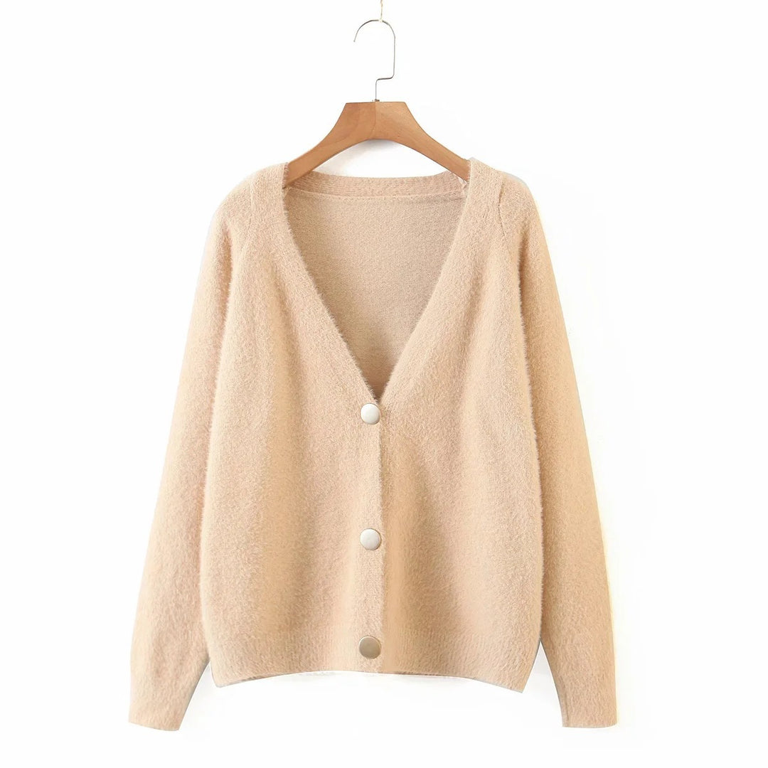 Kvinnens koselige cardigan med store knapper og oversized passform Skjora
