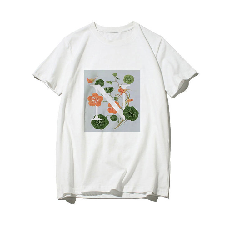 Dame T-skjorte med blomsterdesign og kreativt trykk Skjora
