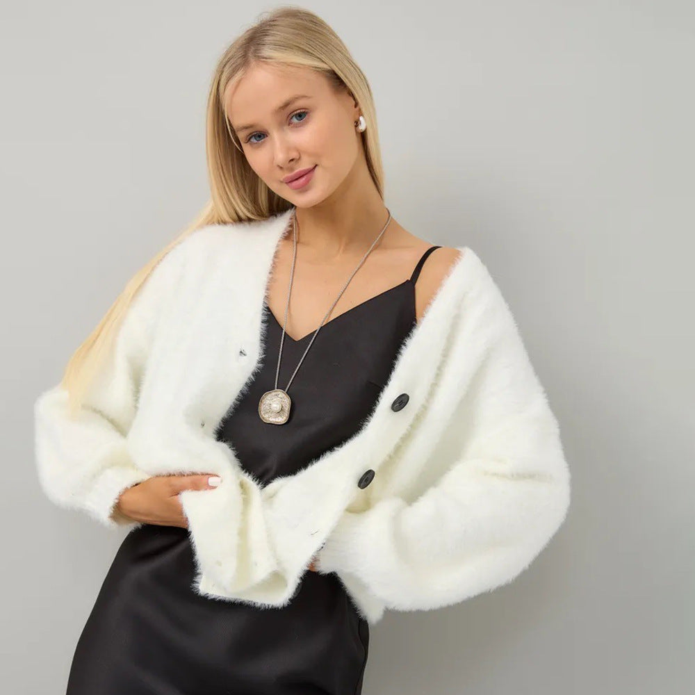 Kvinnens koselige cardigan med asymmetrisk snitt og knappeåpning Skjora